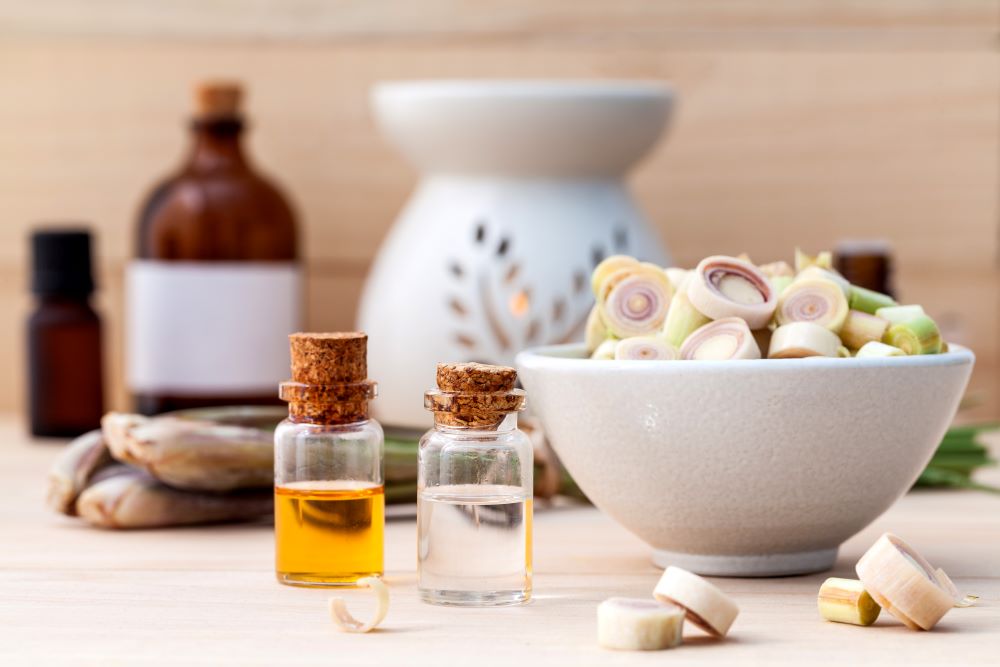 Chopped Lemongrass in a Bowl, Essential Oils and and Oil Diffuser