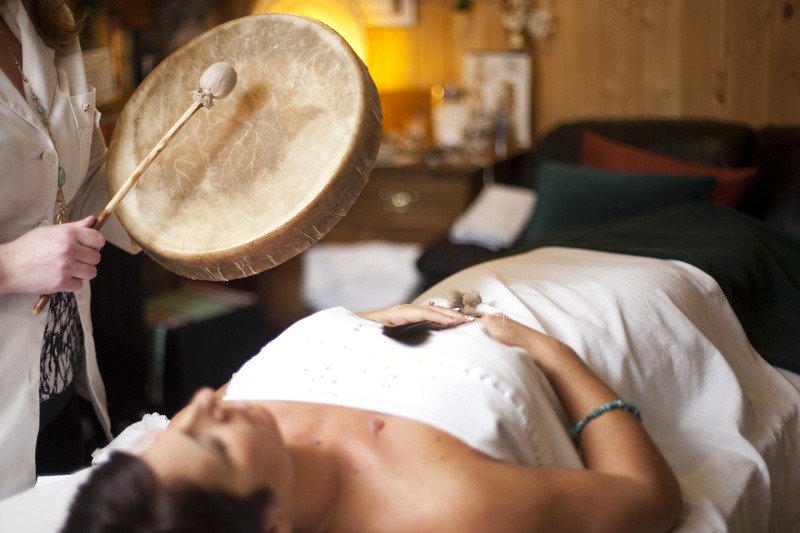 Medical Professional Drumming Over Patient