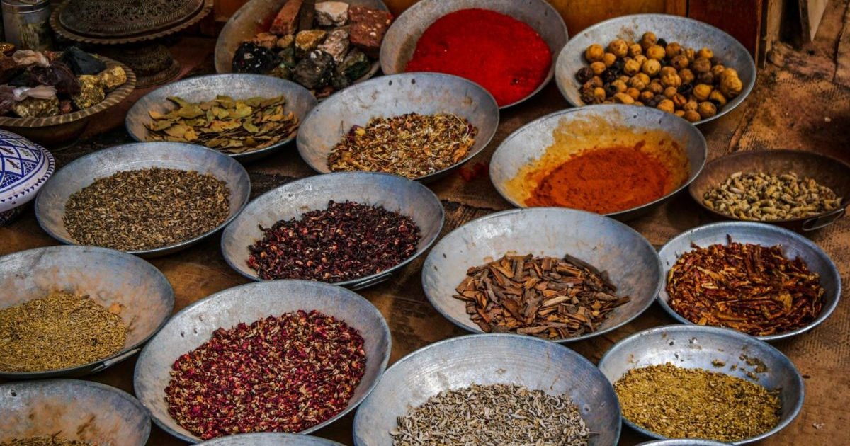 Metal Bowls of Various Dried Herbs and Spices