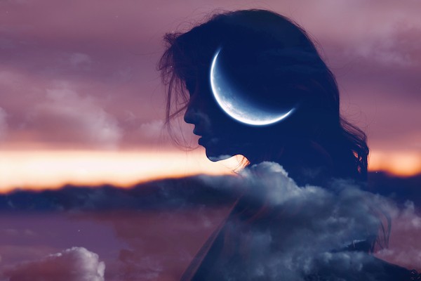Woman profile silhouette portrait with moon in her head Beautiful woman profile silhouette portrait with moon in her head.