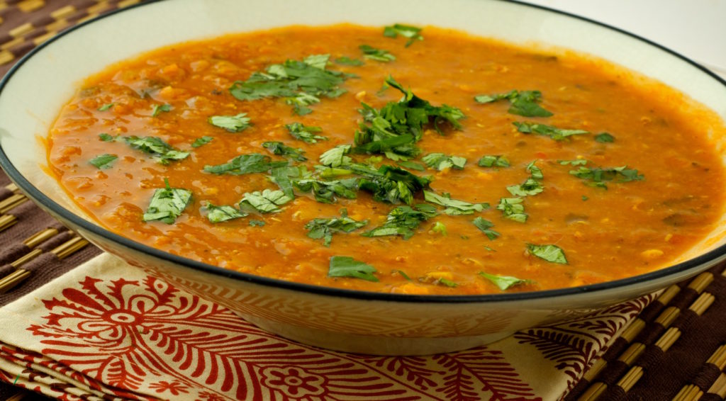 Bowl of Lentil Soup with Cilantro Garnish